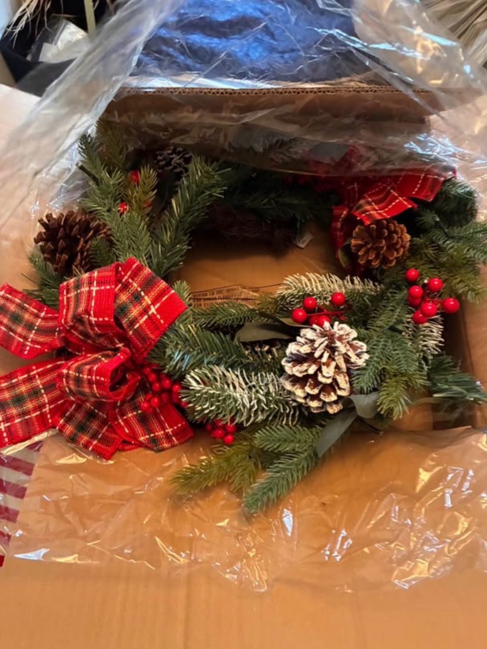 BrandFestive Red & Green Holiday Pine Garland with Plaid Bow from Montgomery War